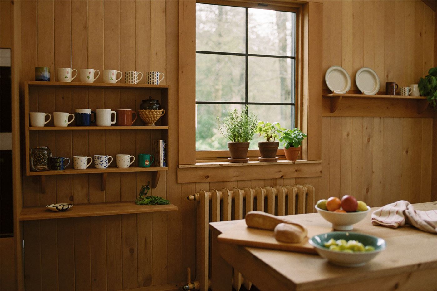 A warm wooden kitchen in soft morning light